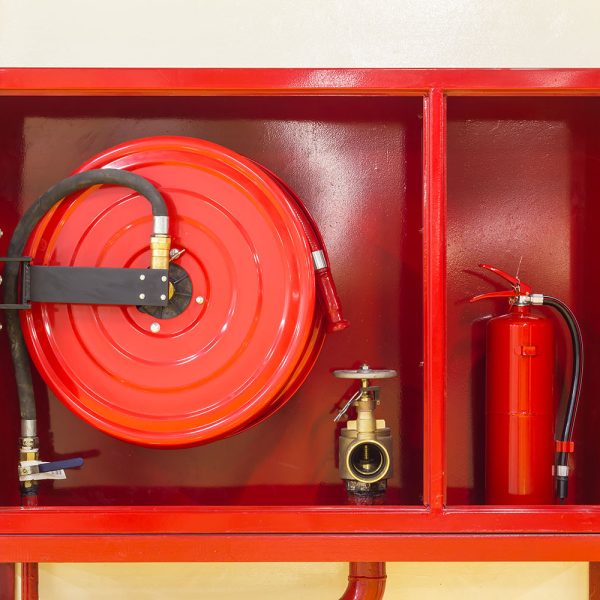 Closed-up red cabinet (The door was opened) for Fire Extinguisher, Fire Hose and Fire Hose Valve